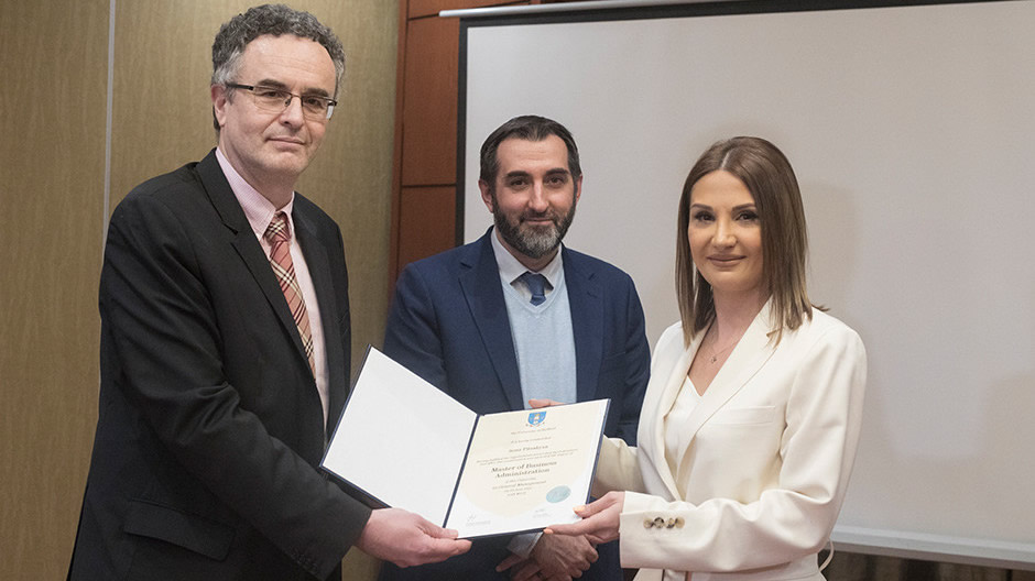 The degrees were presented by Prof. Leslie Szamosi, Director of the Executive MBA programme and Victor Clark, Deputy Head of Mission of the British Embassy